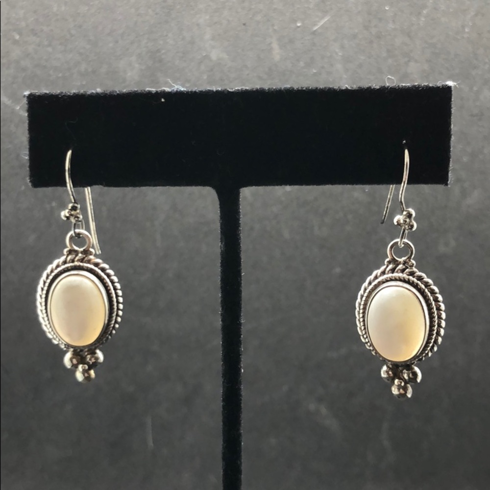 Silver and white stone earrings